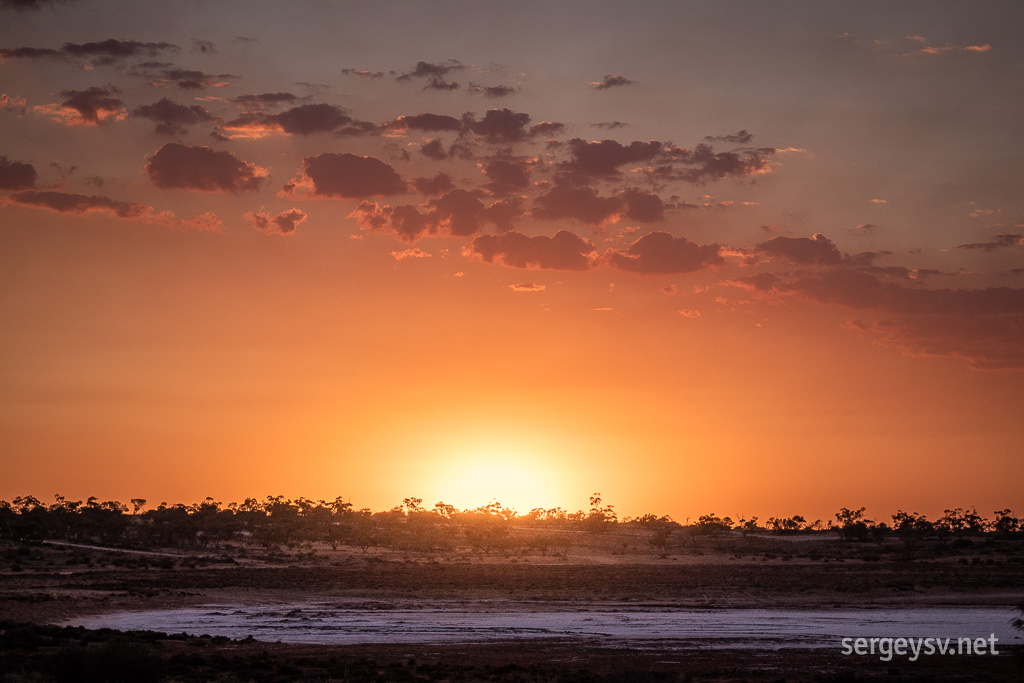 Sun rises over the salt lake.