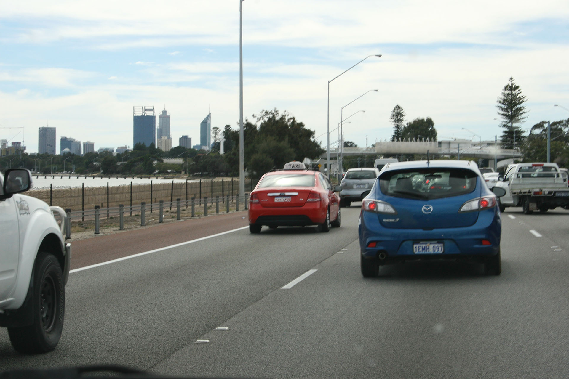 Cars, traffic lights, skyscrapers. Getting used to it again.