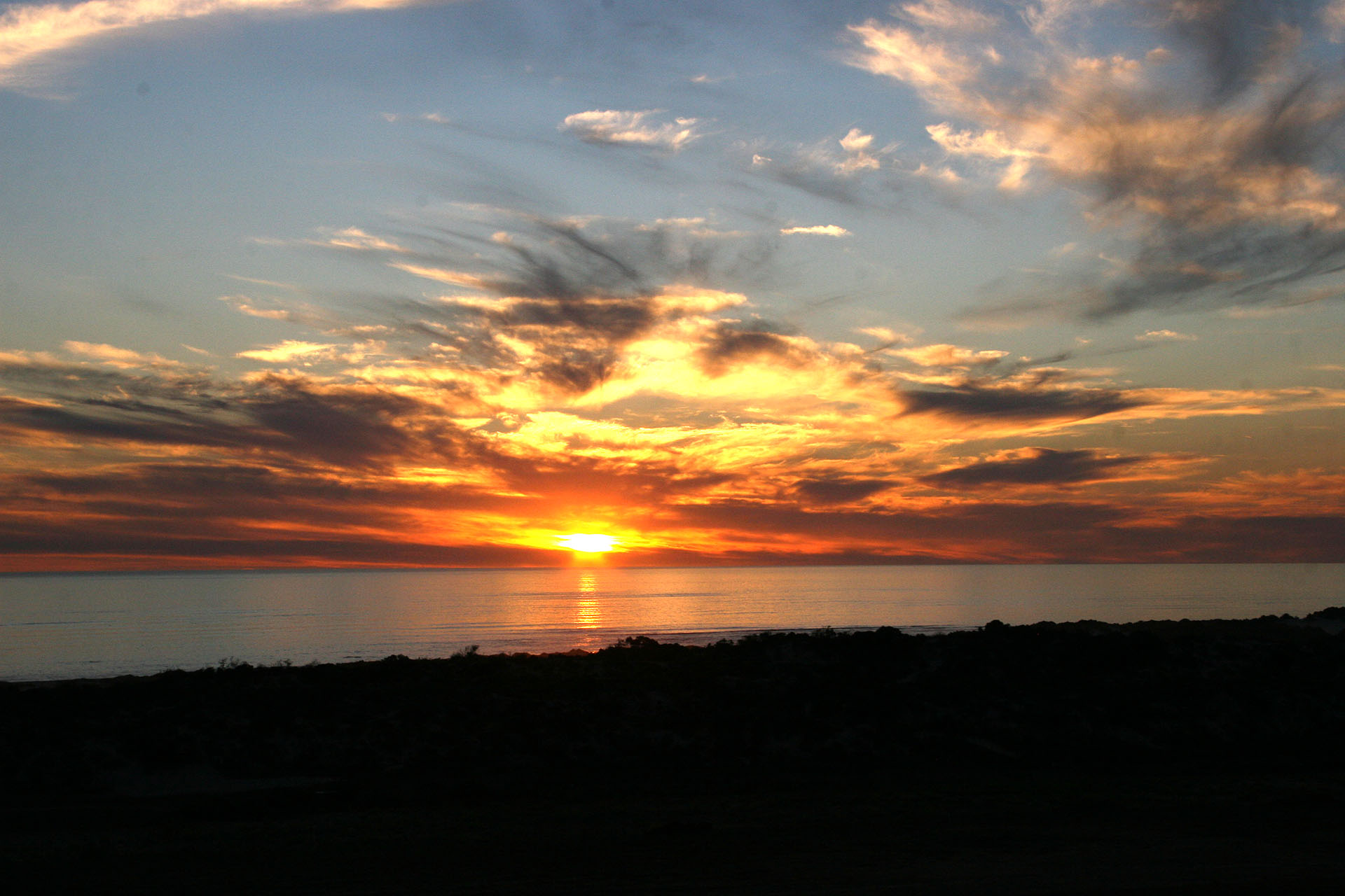 The sun sets over the Indian Ocean.