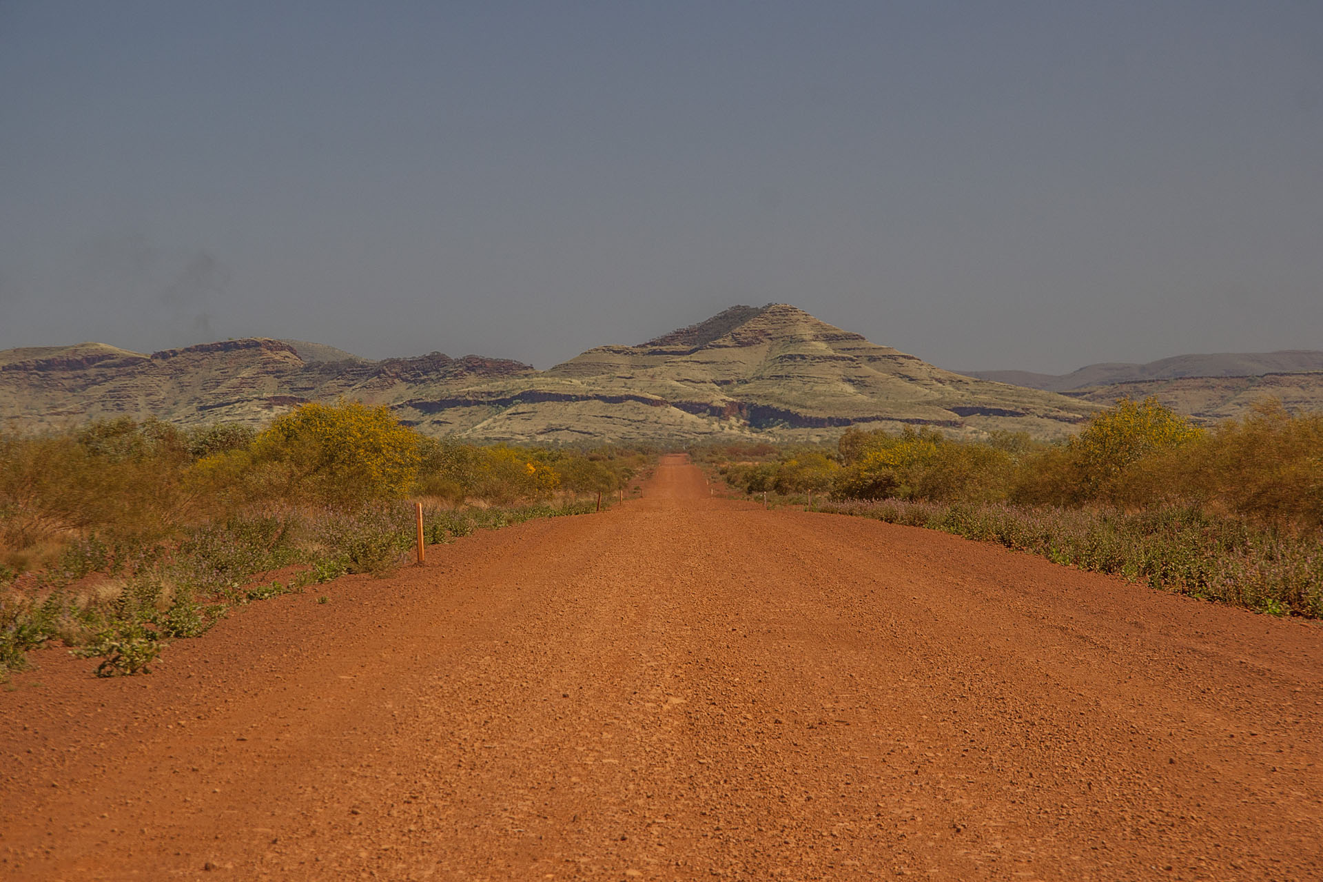 Dirt road and hills, and more bushfire.