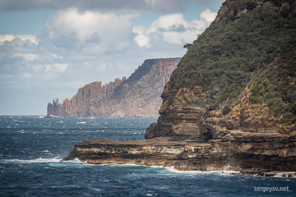 Devilish-looking cliffs in the distance.