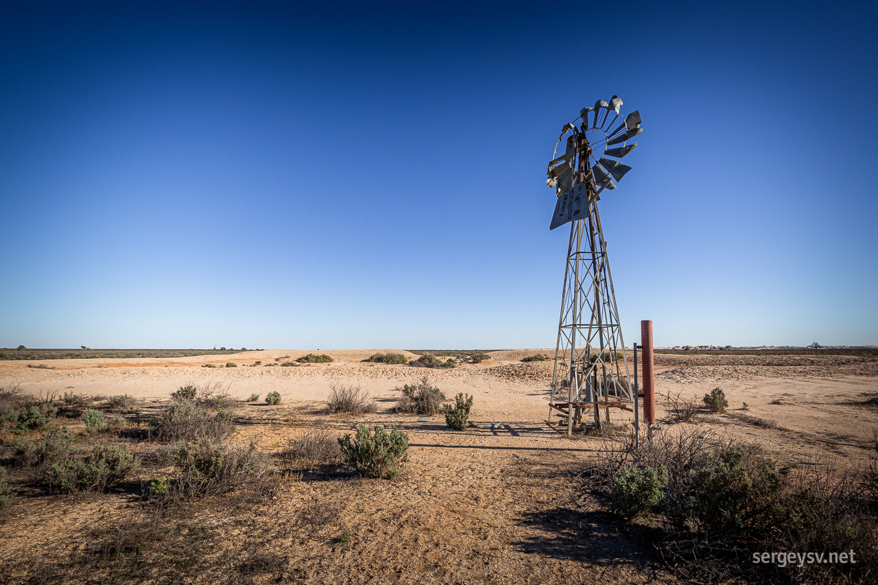 The landscape wouldn't be Australian without a rusty windmill here and there.