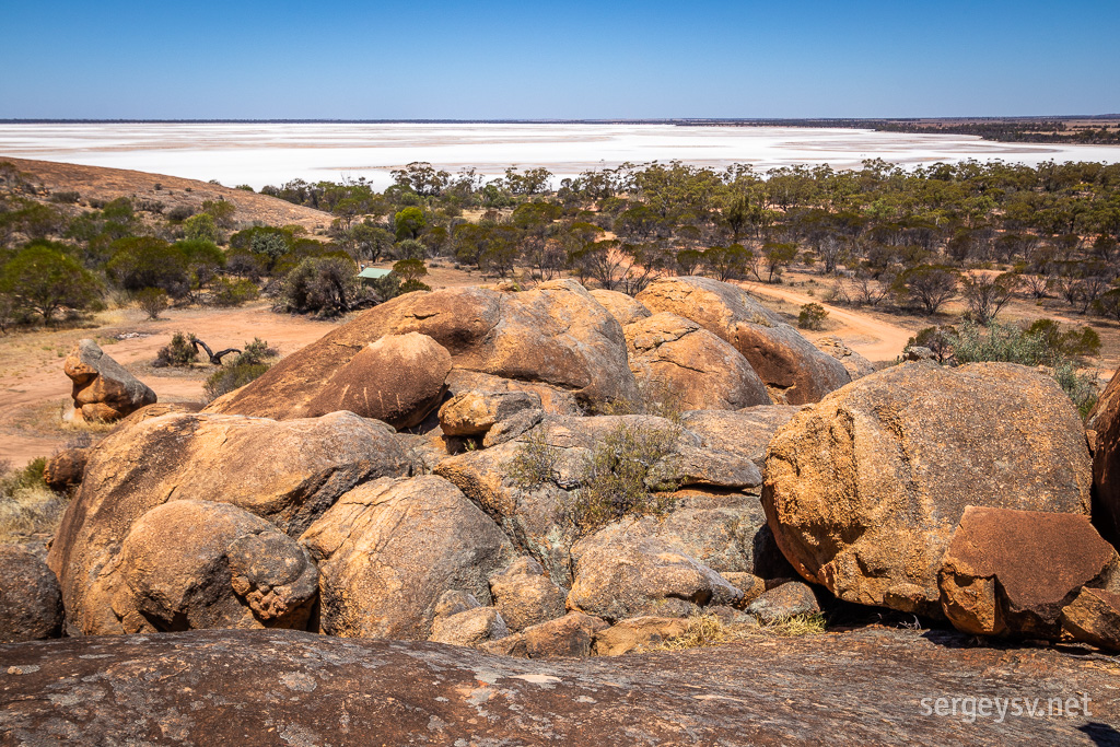 The rocks, the lake, and the camping spot (you can even see the roof of the toilet).